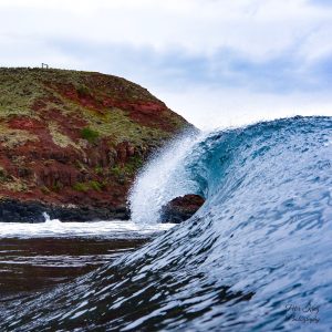 Blue Swells Breaking on Red Earth